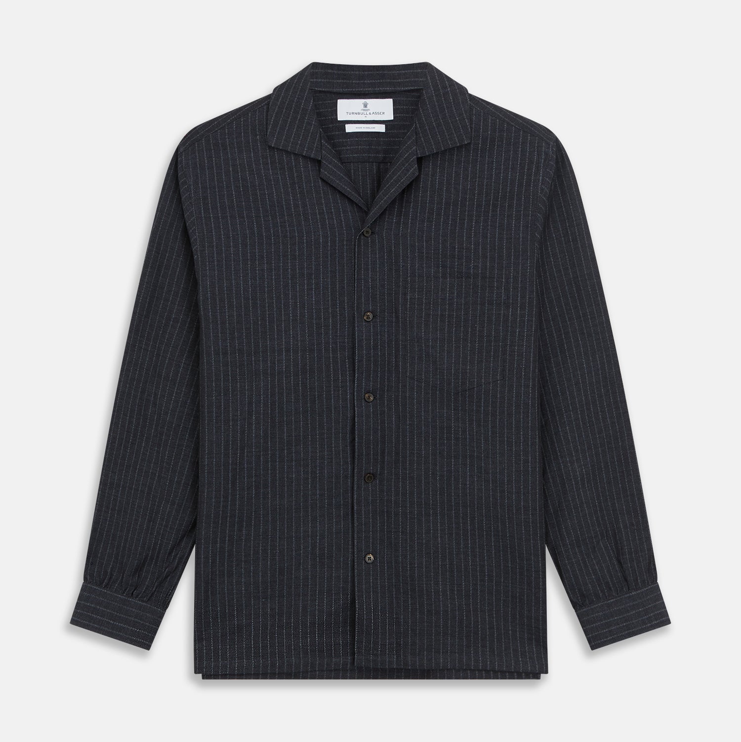 View 1 of product The Navy Tailored Pinstriped Shirt Jacket by Turnbull & Asser is a smart-casual, lightweight cotton-linen piece with long sleeves, a collar, left chest pocket, and front buttons for easy style.