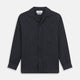 The Navy Tailored Pinstriped Shirt Jacket by Turnbull & Asser is a smart-casual, lightweight cotton-linen piece with long sleeves, a collar, left chest pocket, and front buttons for easy style.