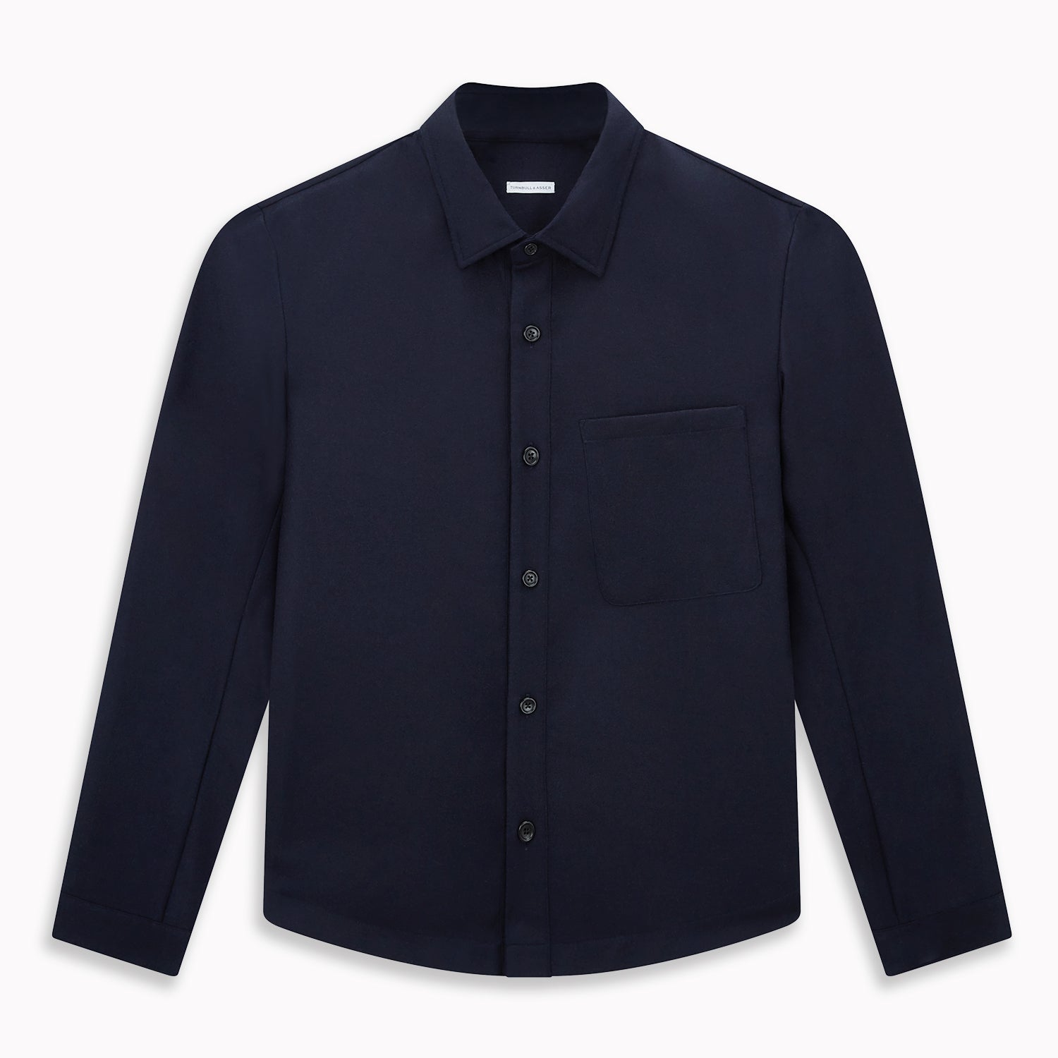 View 1 of product The Turnbull & Asser Midnight Blue Highbury Overshirt, featuring long sleeves, a collar, and a single chest pocket, is shown laid flat against a white background.
