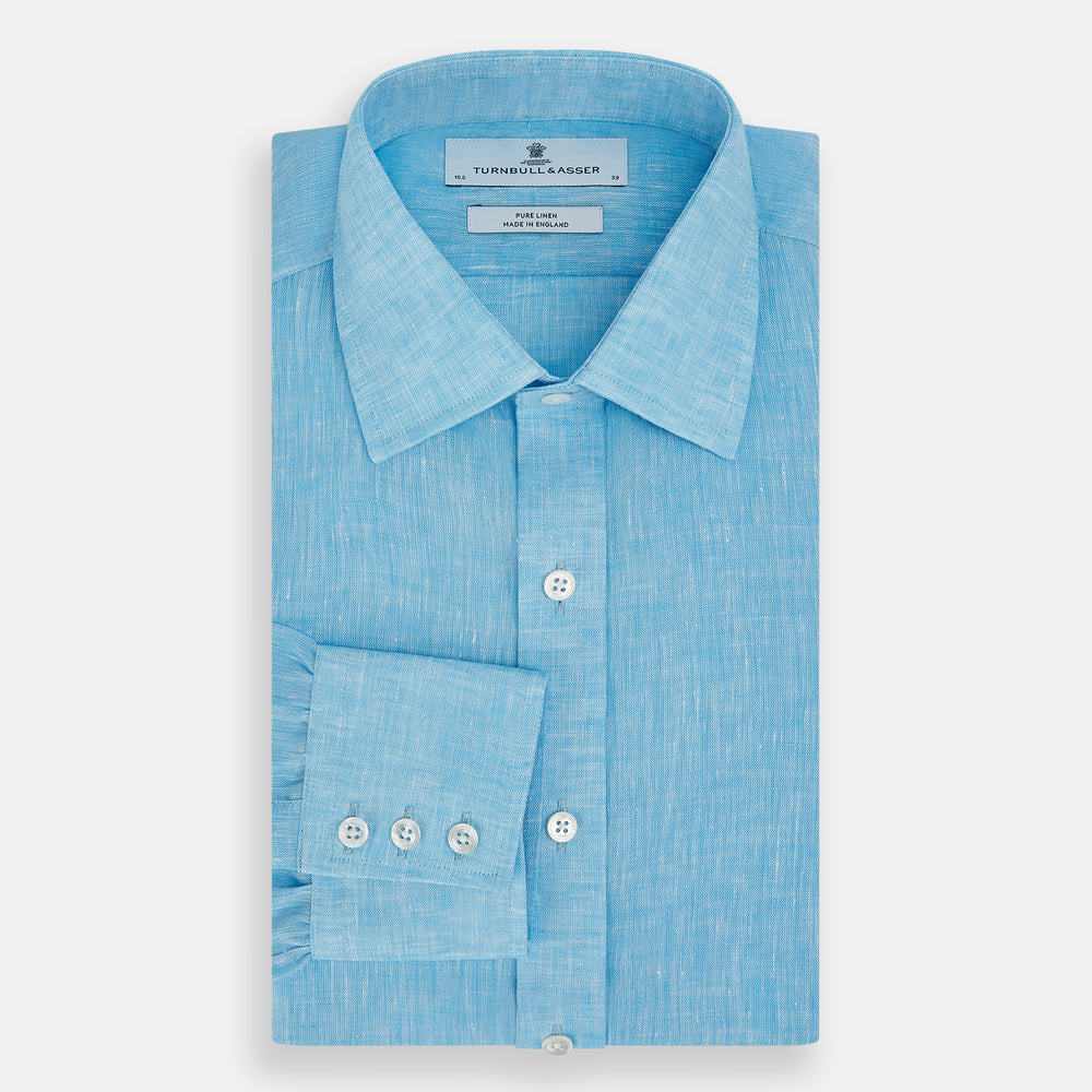 The Turnbull & Asser Turquoise Linen Mayfair Shirt features long sleeves and a collar, displayed neatly on a white background.
