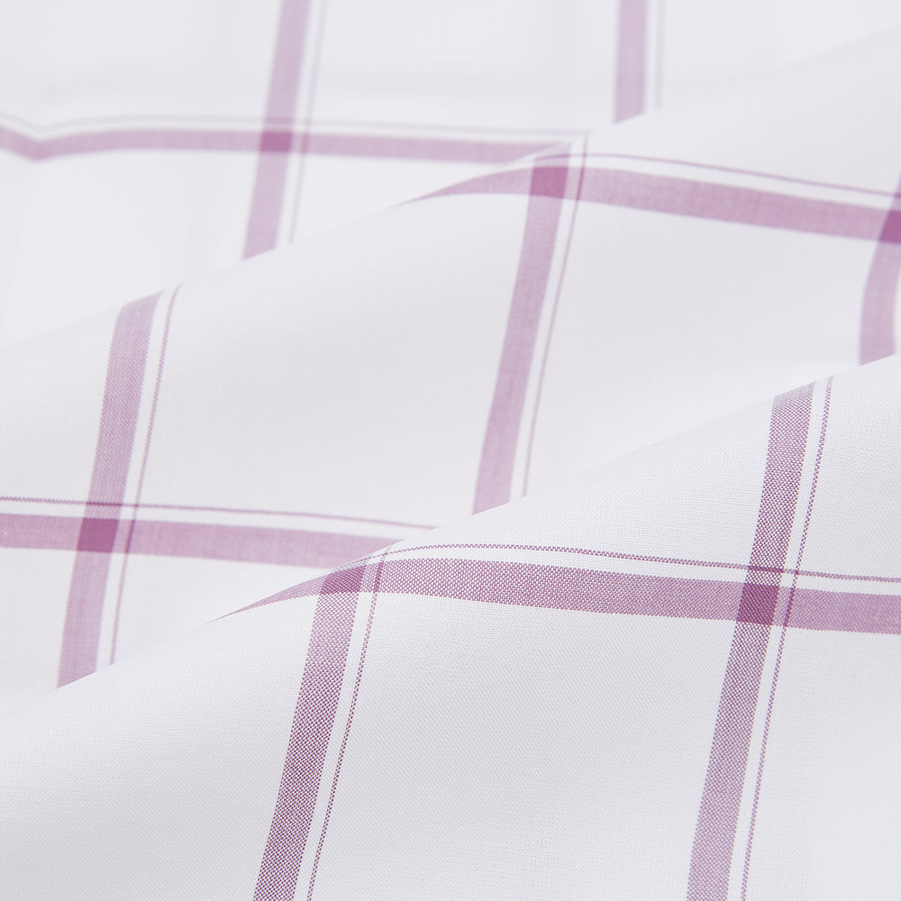 The Antique Pink Grid Check Mayfair Shirt by Turnbull & Asser is a long-sleeve shirt made from Italian cotton, featuring evenly spaced pink grid checks, displayed flat on a white background.