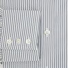 View 4 of product The Turnbull & Asser Grey Multi Stripe Mayfair Shirt features long sleeves, a classic collar, and thin vertical stripes in black and white, shown laid flat on a white background.