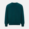 View 3 of product The Moss Green Cashmere V-Neck Jumper by Turnbull & Asser features long sleeves with ribbed cuffs and hem, shown on a plain white background.