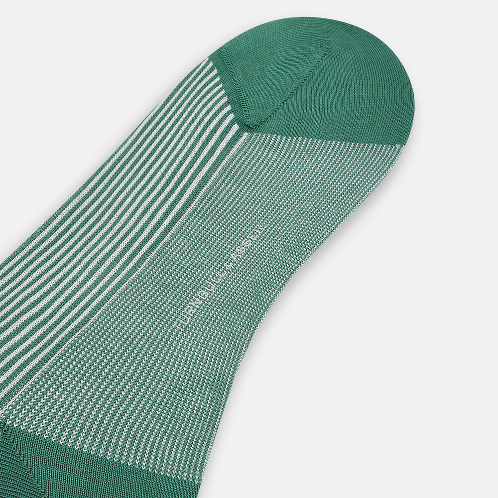 Turnbull & Asser Melon Green/White Thin Striped Long Sock features melon green and white vertical stripes with a solid green toe, heel, and cuff, shown singly against a plain light background.