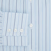 View 4 of product The Turnbull & Asser Navy and Blue Combination Stripe Mayfair Shirt, featuring thin vertical stripes and a classic collar, is displayed laid flat on a white background.