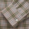 View 3 of product The Turnbull & Asser Green and Oatmeal Multi Check Cotton Weekend Fit Hayne Shirt features a button-down collar and green, beige, and white plaid pattern, shown flat against a white background.