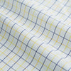View 6 of product The Turnbull & Asser Yellow Overlay Grid Check Mayfair Shirt is a long-sleeve, button-down shirt made from soft organic cotton, featuring a yellow grid check pattern and shown laid flat on a white background.