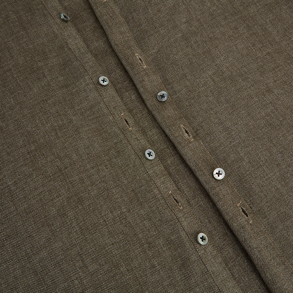 The Olive Linen Windsor Shirt by Turnbull & Asser features long sleeves, a classic Windsor collar, buttoned cuffs, and a straight hem—expertly crafted in Britain and shown against a white background.