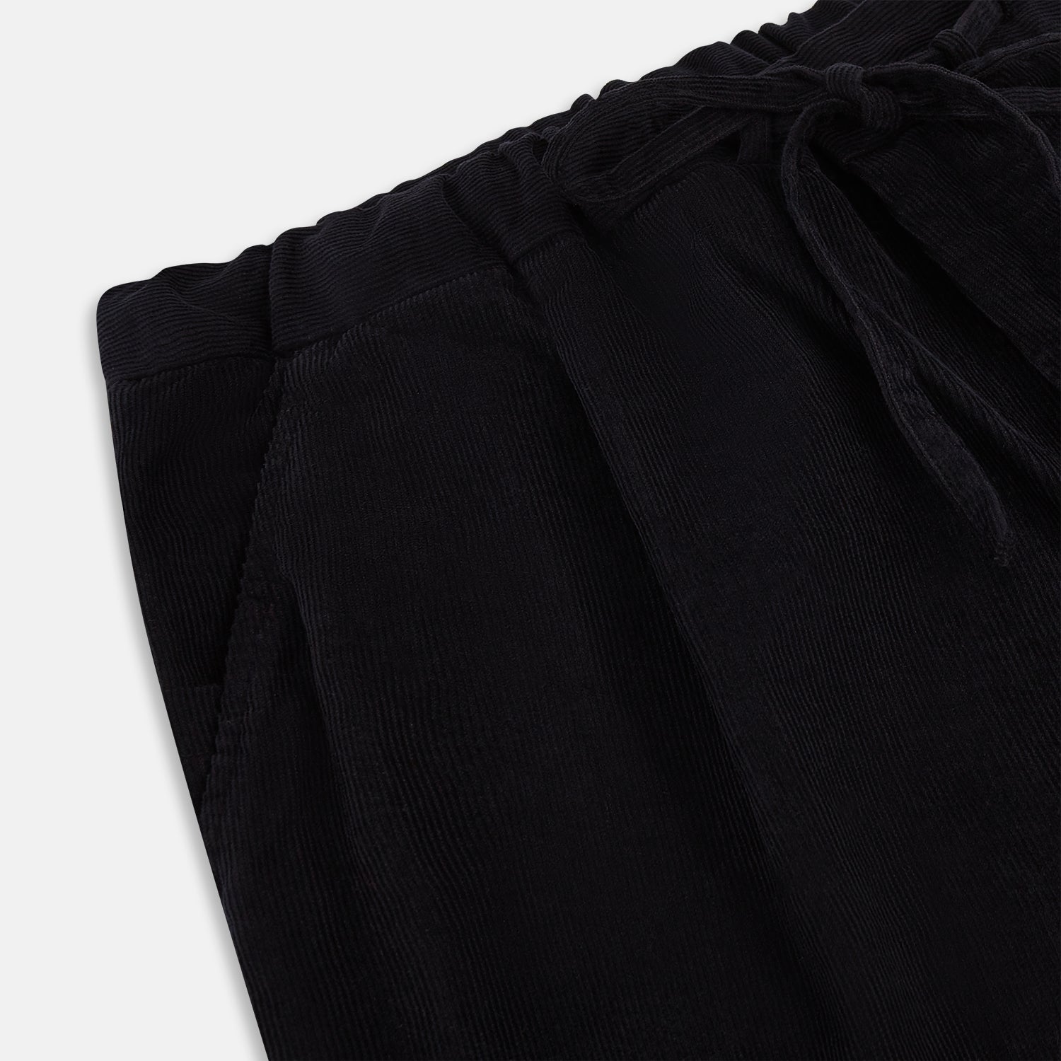 View 2 of product Navy Corduroy Miles Trousers by Turnbull & Asser, featuring an elasticated waist, straight-leg cut, and side pockets, displayed flat on a white background.