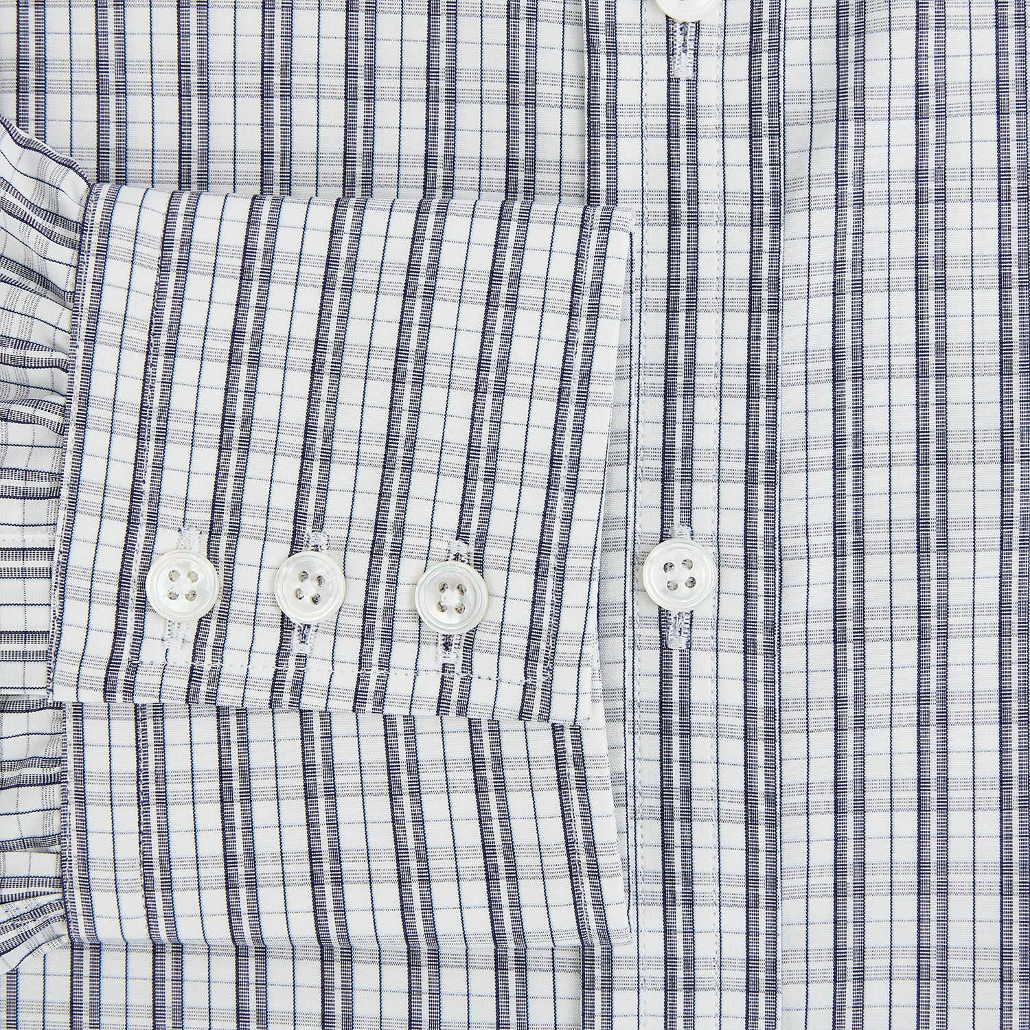 View 4 of product The Turnbull & Asser Navy Multi Check Mayfair Shirt is made from pure cotton with a blue and white check pattern, long sleeves, pointed collar, and buttoned cuffs, shown against a white background.