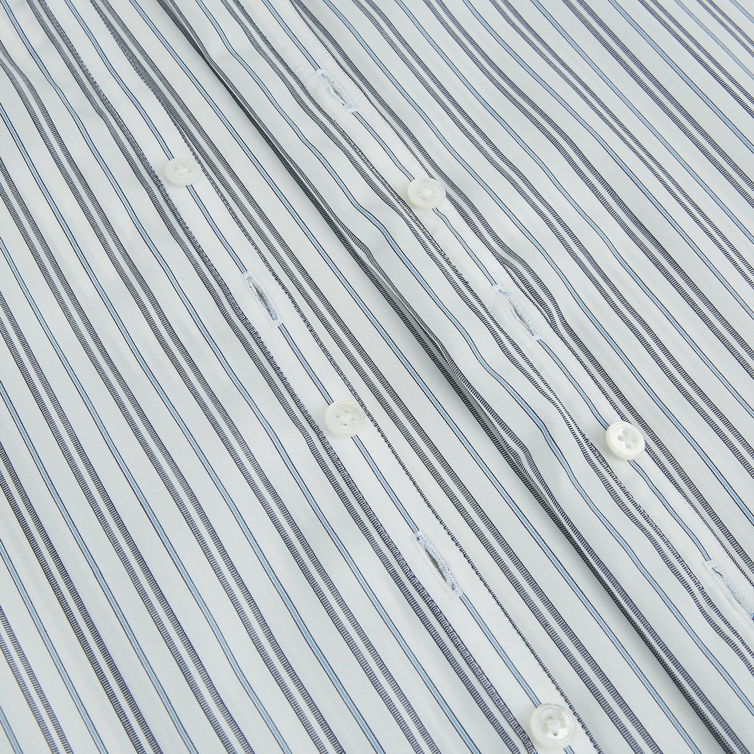 View 7 of product The Turnbull & Asser Navy and Light Blue Multi Track Stripe Westminster Shirt, featuring a button-up design with long sleeves and a signature collar, is displayed flat to highlight its expert British craftsmanship.