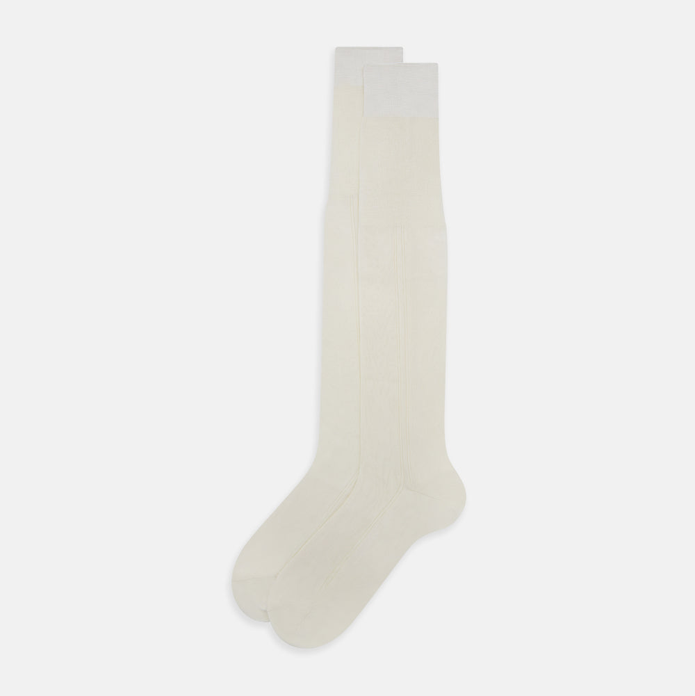 A single Turnbull & Asser Vanilla Silk Long Sock, knee-high and displayed upright, on a plain white background.
