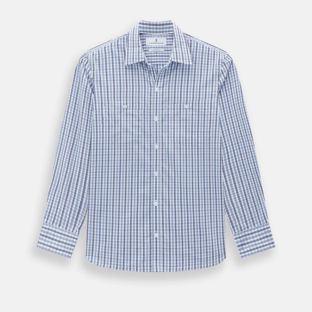 Turnbull & Asser's Blue and Navy Multi Check Piccadilly Shirt features long sleeves, a pointed collar, and two buttoned chest pockets, shown on a white background.