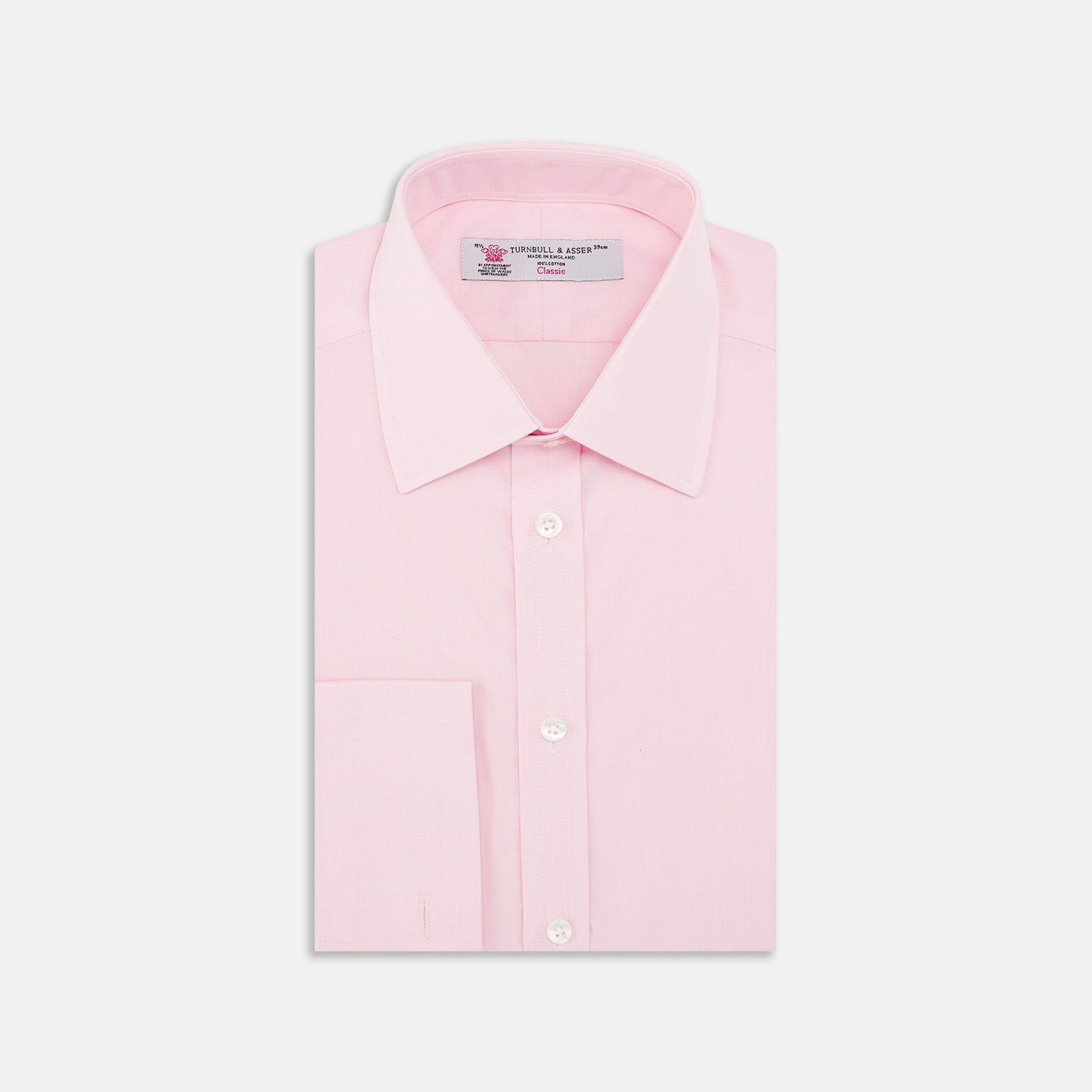 View 1 of product The Pink End-on-End Shirt with T&A Collar and Double Cuffs by Turnbull & Asser, shown neatly folded on a white background, updates timeless elegance with its classic detailing and refined pink hue.