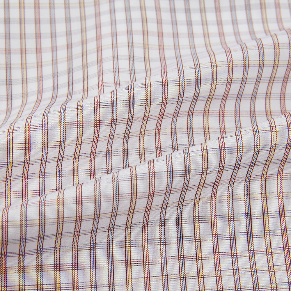 The Turnbull & Asser Multicoloured Check Mayfair Shirt is a long-sleeve, button-up shirt with a classic collar and buttoned cuffs, showcasing a true British checkered pattern on a white background.