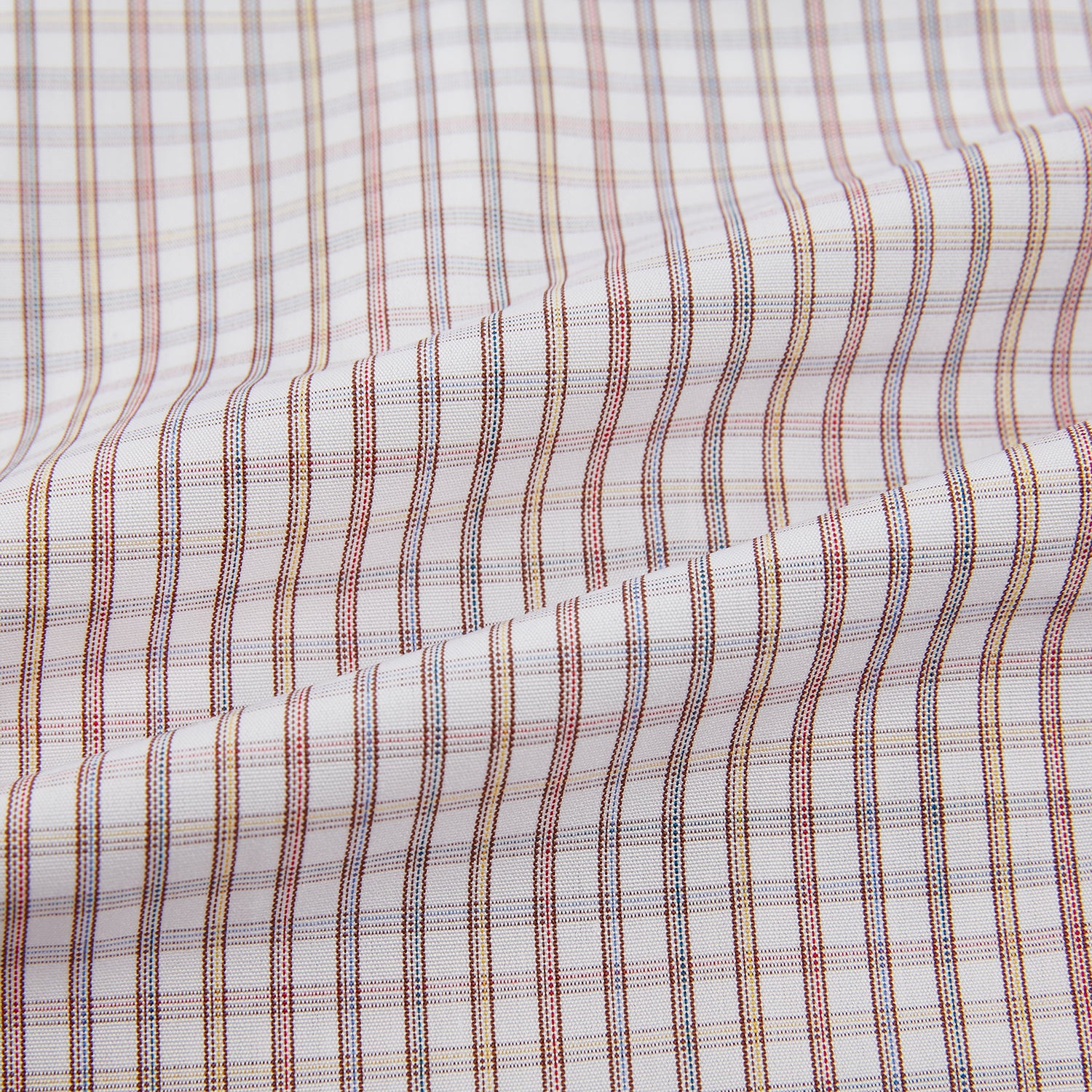 View 6 of product The Turnbull & Asser Multicoloured Check Mayfair Shirt is a long-sleeve, button-up shirt with a classic collar and buttoned cuffs, showcasing a true British checkered pattern on a white background.
