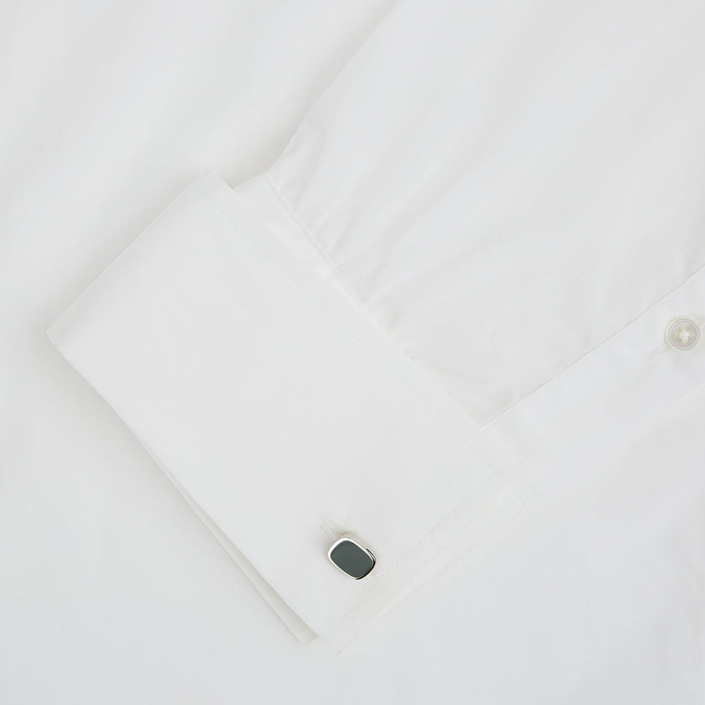 Turnbull & Asser's Green Rounded Square Cufflinks feature sterling silver and dark green faces—sophisticated formal accessories perfect for elevating any refined ensemble.