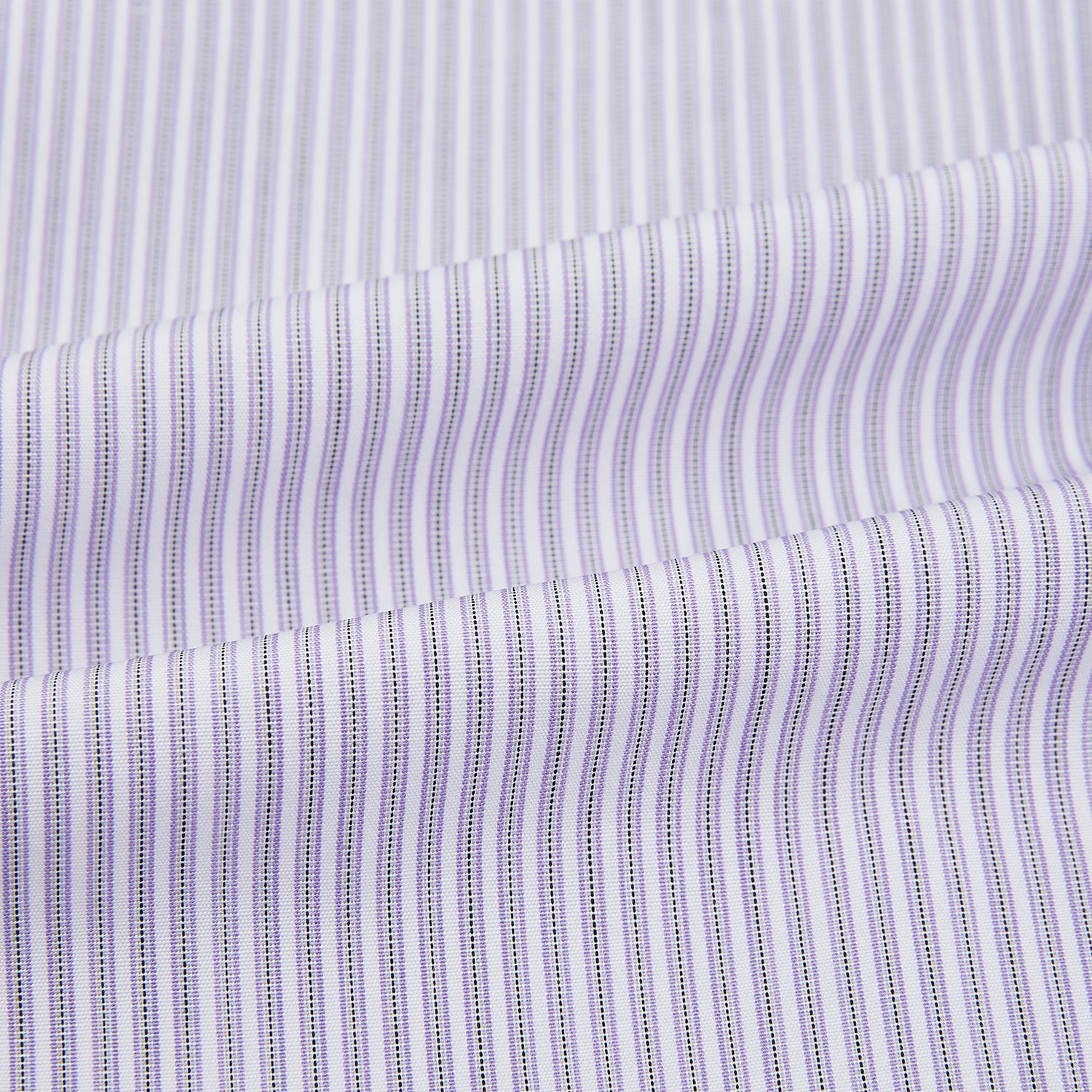 View 6 of product The Lilac Halo Stripe Mayfair Shirt by Turnbull & Asser features a relaxed Mayfair fit, white buttons, a pointed collar, and a subtle lilac stripe pattern for timeless sophistication.
