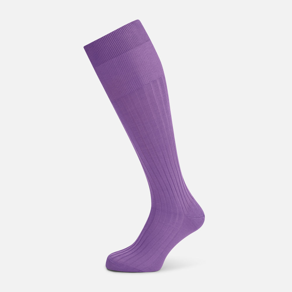 The Turnbull & Asser Violet Long Sock, crafted from mercerised Egyptian cotton, is shown in side profile against a white background, highlighting its knee-high length and ribbed texture.