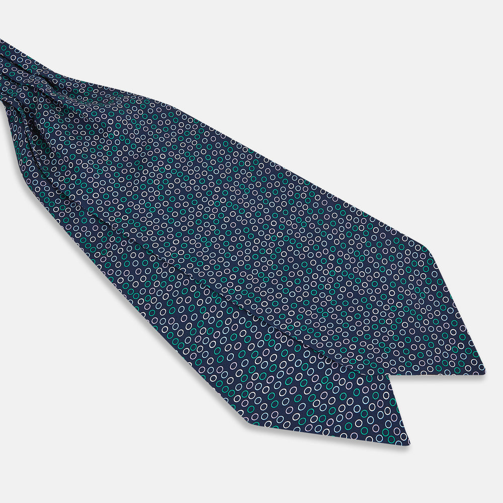 Turnbull & Asser's Multicoloured Dark Navy Circle Silk Cravat features blue, white, and green-outlined circles—ideal for weddings or pairing with classic British attire.
