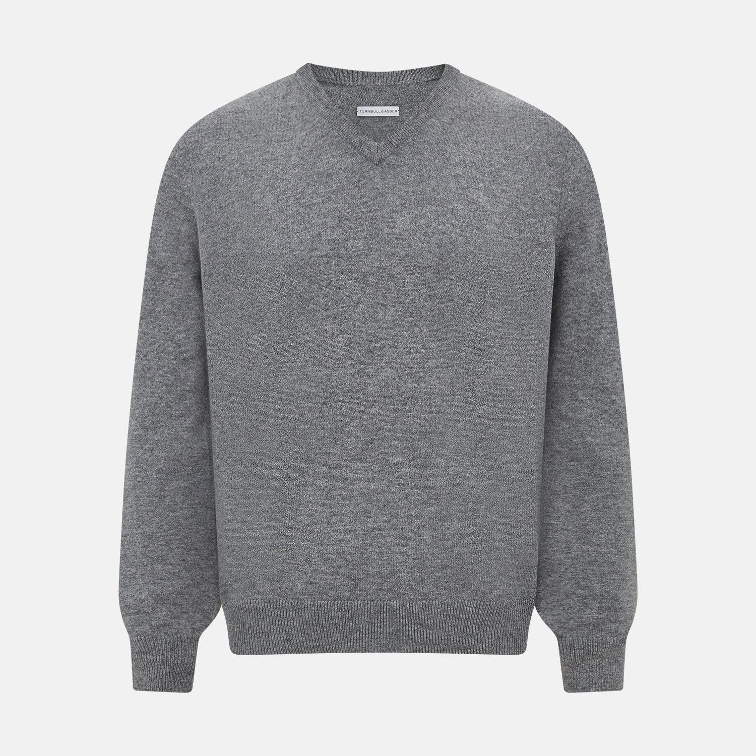 View 1 of product The Turnbull & Asser Grey Melange Cashmere V-neck Jumper features long sleeves, ribbed cuffs and hem, showcasing timeless style against a white background.