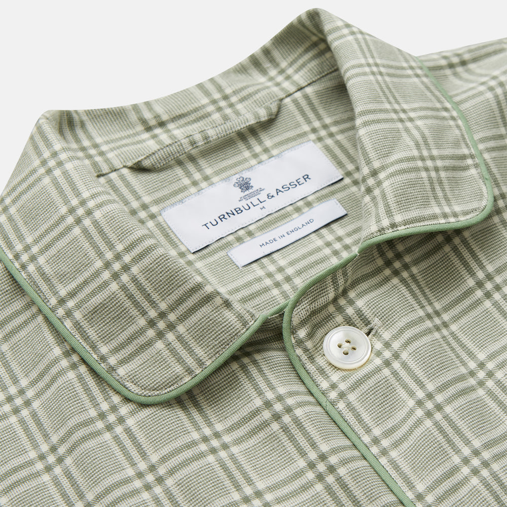 The Turnbull & Asser Green Check Modern Cotton Pyjama Set features a contemporary fit in white and green plaid, made from thicker cotton for added comfort.