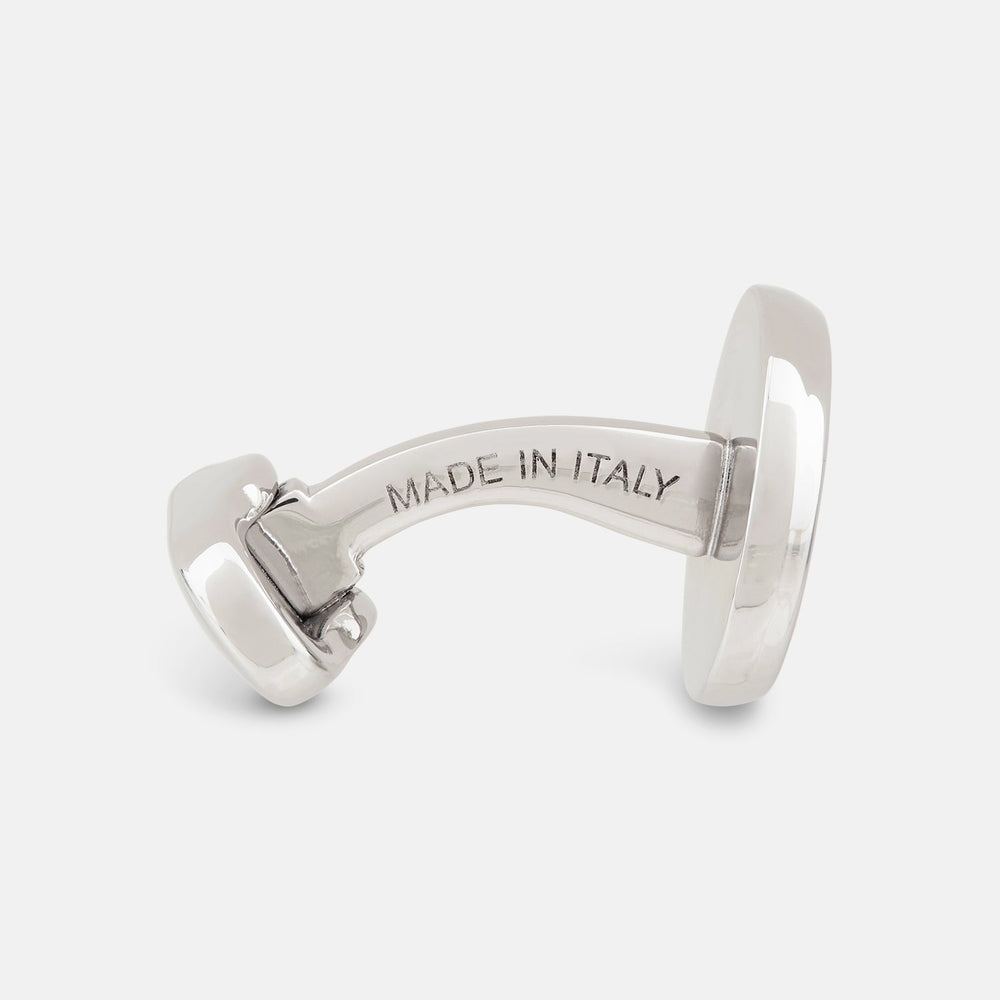 Turnbull & Asser's Navy Gemstone Circle Cufflinks feature round sterling silver with black enamel centers and a clear gemstone, shown on a white background.