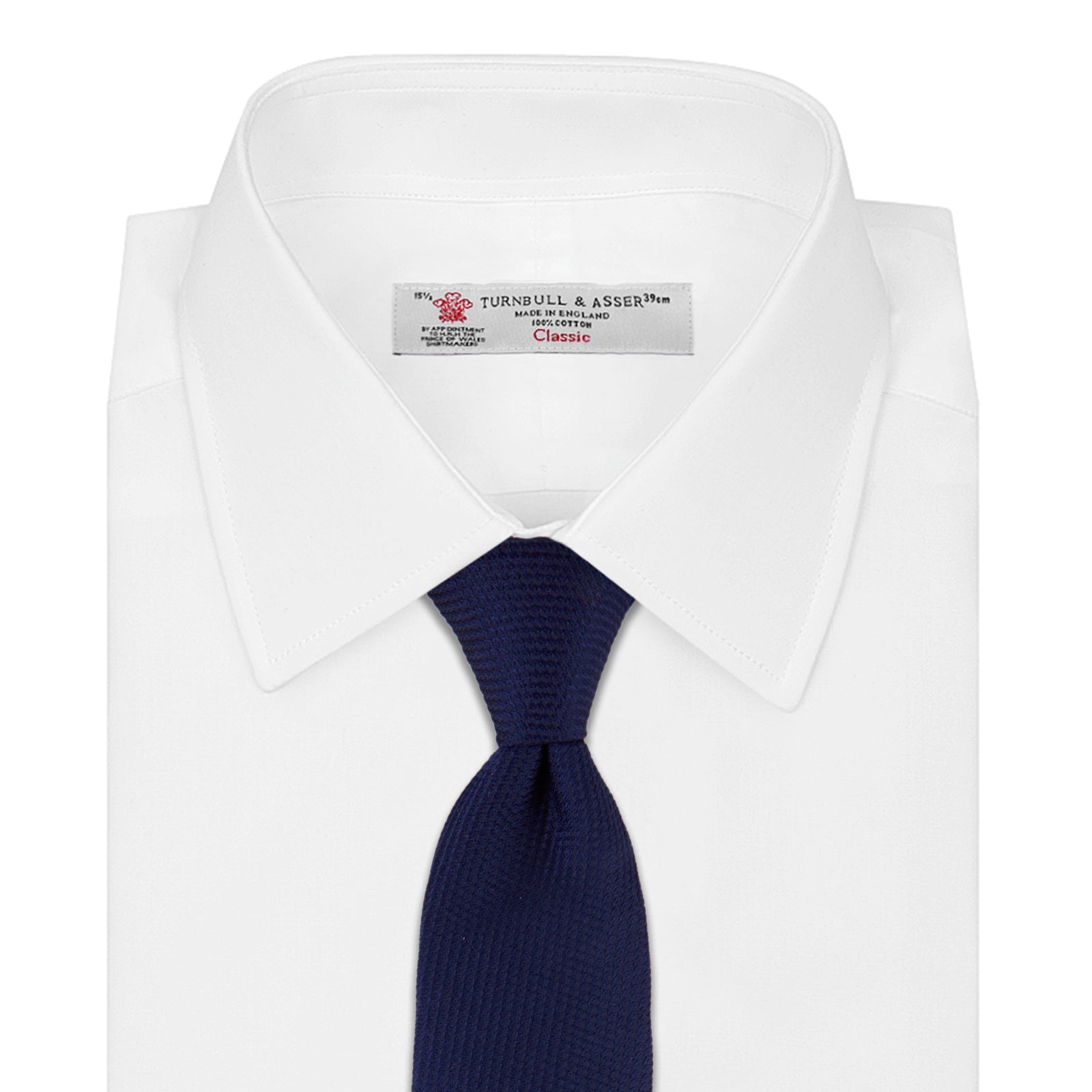 View 2 of product The Turnbull & Asser Seven-Fold Navy Lace Silk Tie is shown on a white background, rolled at one end with the pointed tip facing forward.