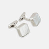 View 1 of product Turnbull & Asser Mother of Pearl Square Cufflinks feature sterling silver-toned frames with white, iridescent mother of pearl inlays, shown against a plain white background.