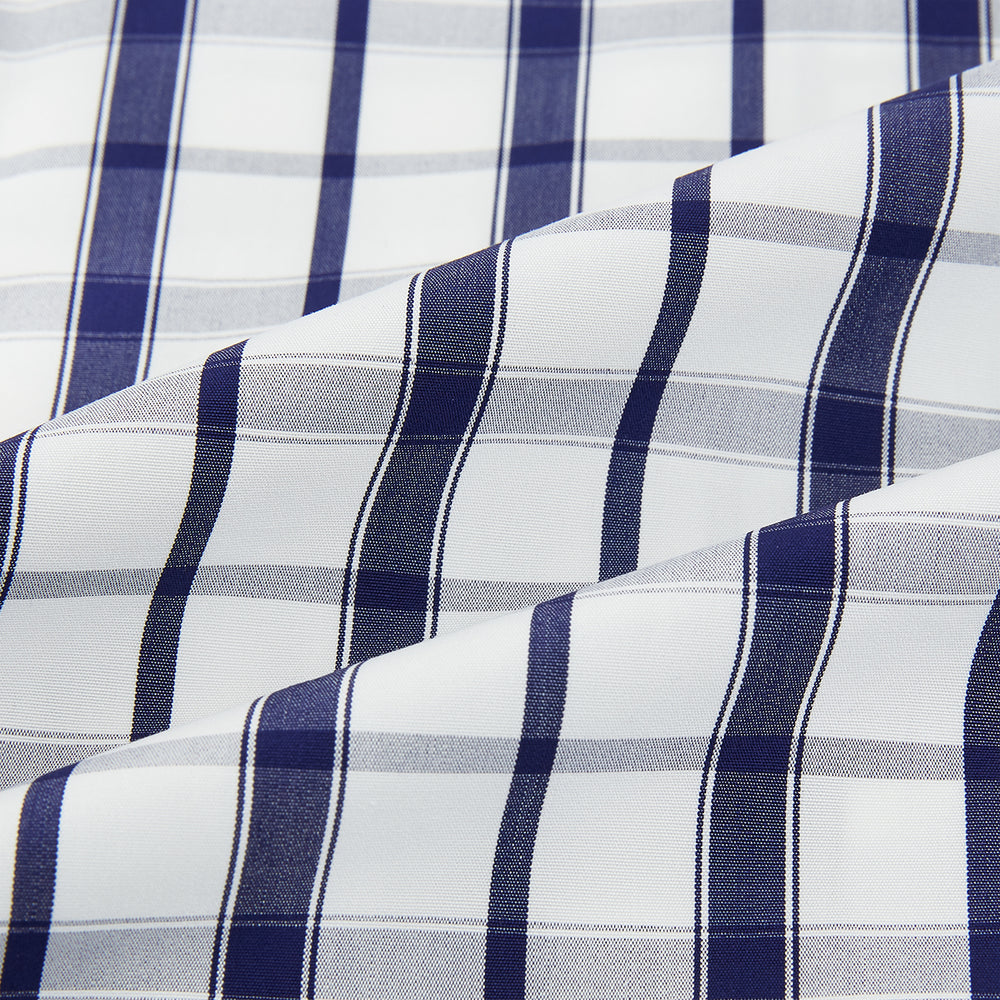 The Turnbull & Asser Navy Plaid Check Mayfair Shirt is crafted from pure cotton in white and navy checks, featuring a pointed collar and buttoned cuffs—perfect for formal looks.