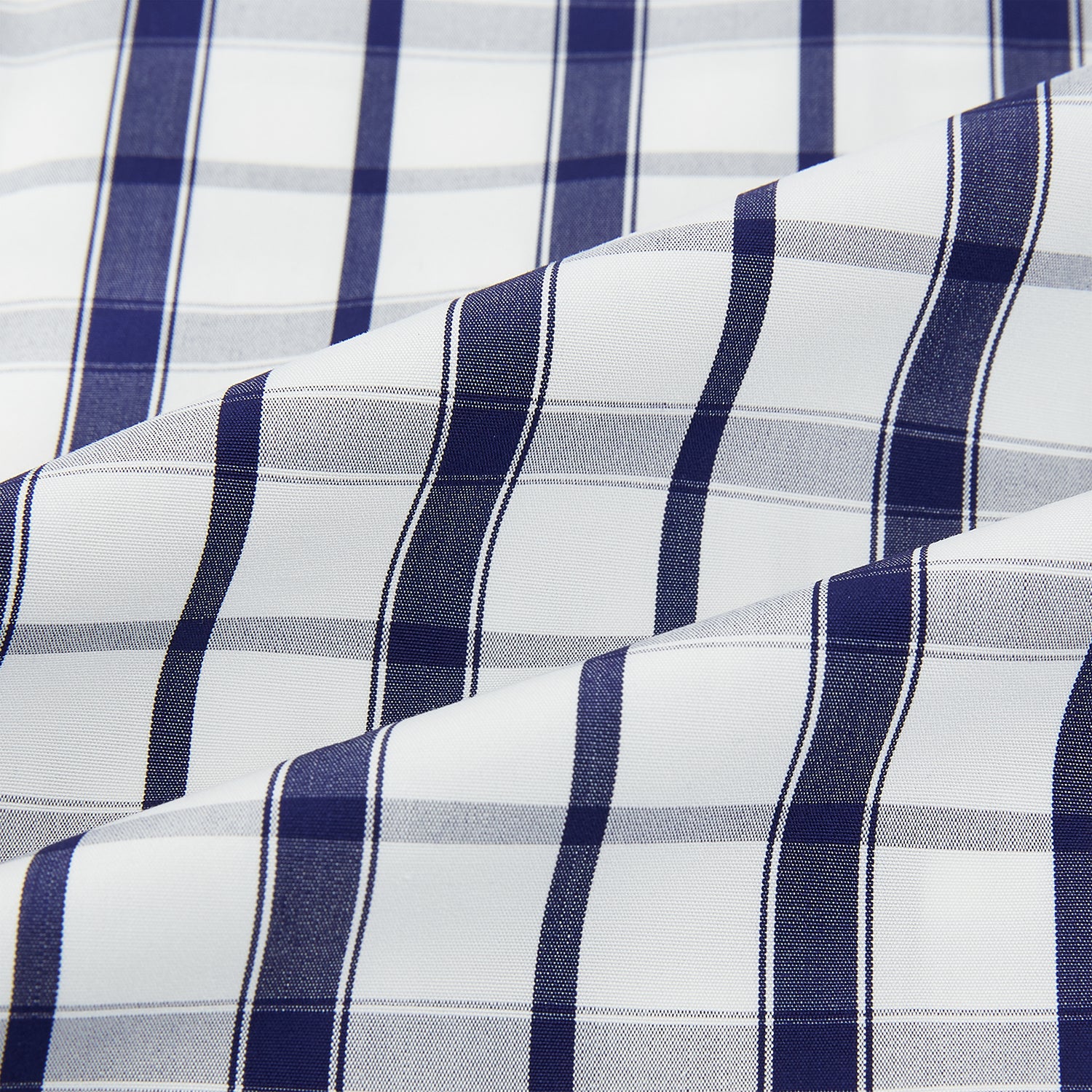 View 6 of product The Turnbull & Asser Navy Plaid Check Mayfair Shirt is crafted from pure cotton in white and navy checks, featuring a pointed collar and buttoned cuffs—perfect for formal looks.