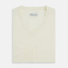 View 4 of product The Turnbull & Asser Cream Fine Merino V-Neck Jumper features long sleeves and classic styling, displayed against a white background.