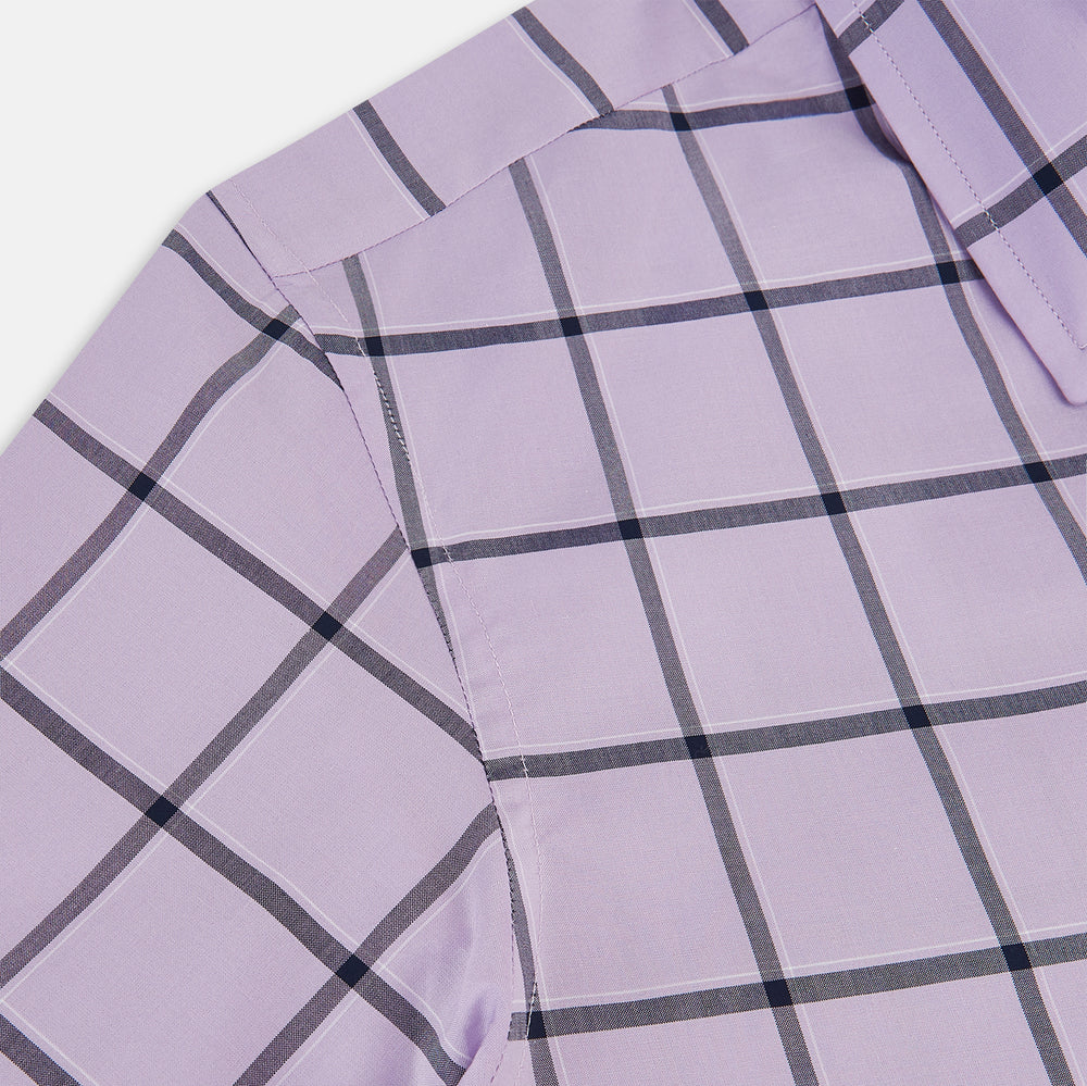 A long-sleeve, button-up Lilac Grid Check Windsor Shirt by Turnbull & Asser, featuring a black windowpane pattern and a refined Windsor collar, displayed on a plain white background.
