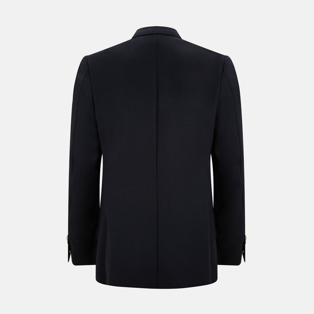 The Turnbull & Asser Navy Double Breasted Classic Blazer features gold buttons, peaked lapels, and multiple front pockets, exemplifying classic British tailoring against a plain light background.