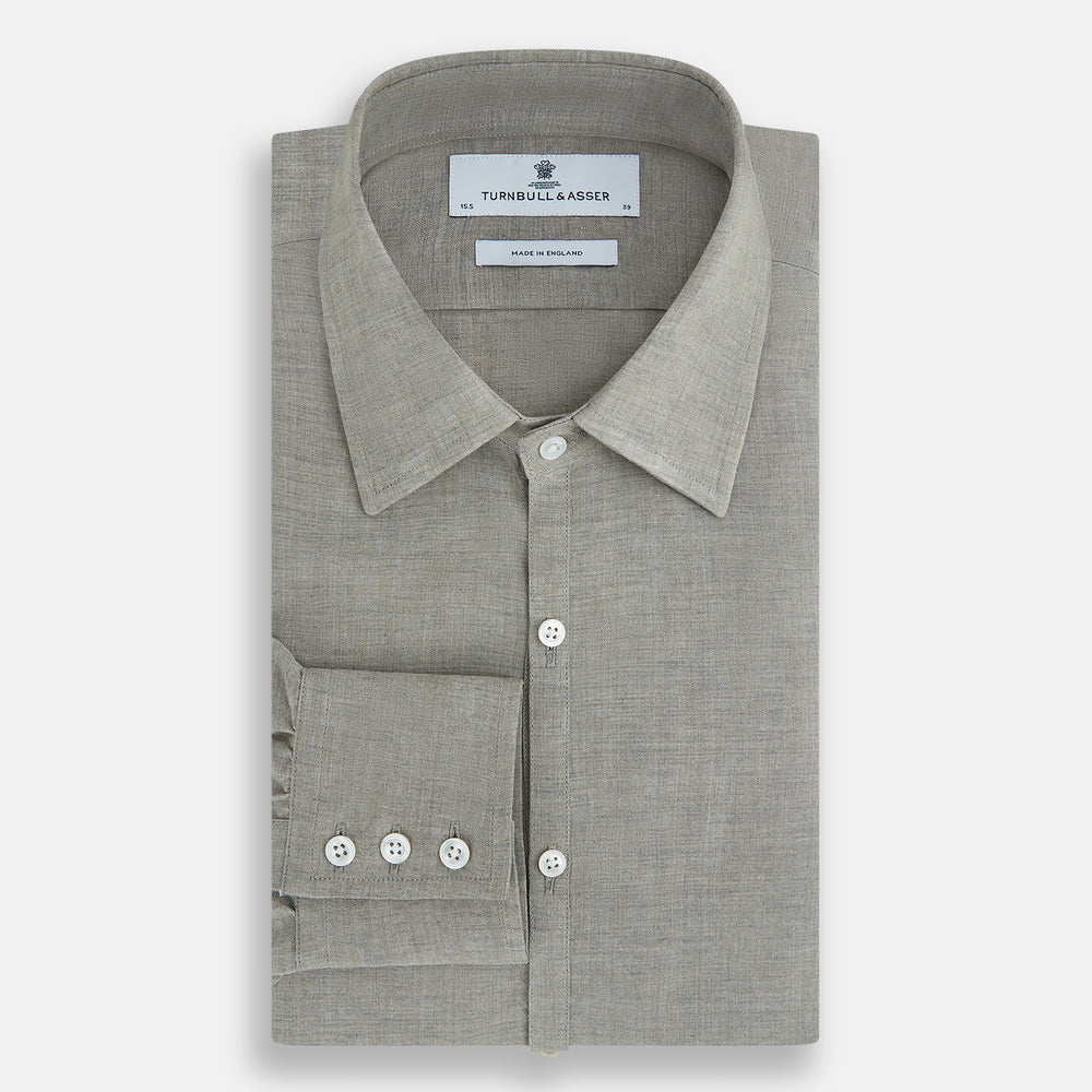 The Flint Grey Linen Westminster Shirt by Turnbull & Asser features long sleeves, a pointed Westminster collar, white buttons, and fine British craftsmanship, shown on a plain white background.