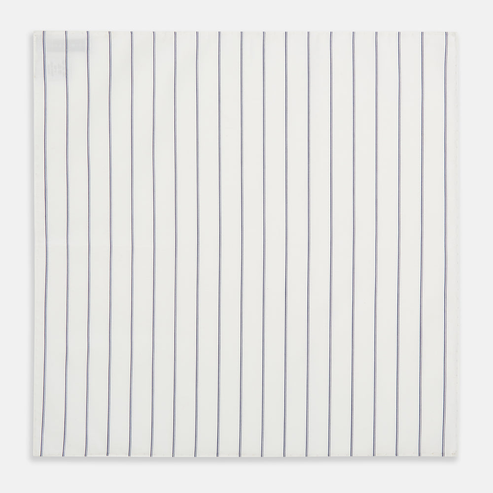 The Dark Navy Double-Pinstripe Hand-Rolled Handkerchief by Turnbull & Asser features white fabric with evenly spaced thin dark navy stripes and refined hand-rolled edges.