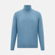 Turnbull & Asser's Pale Blue Fine Merino High Neck Jumper is shown on a plain white background, featuring a simple, classic design with long sleeves and no visible patterns or embellishments.
