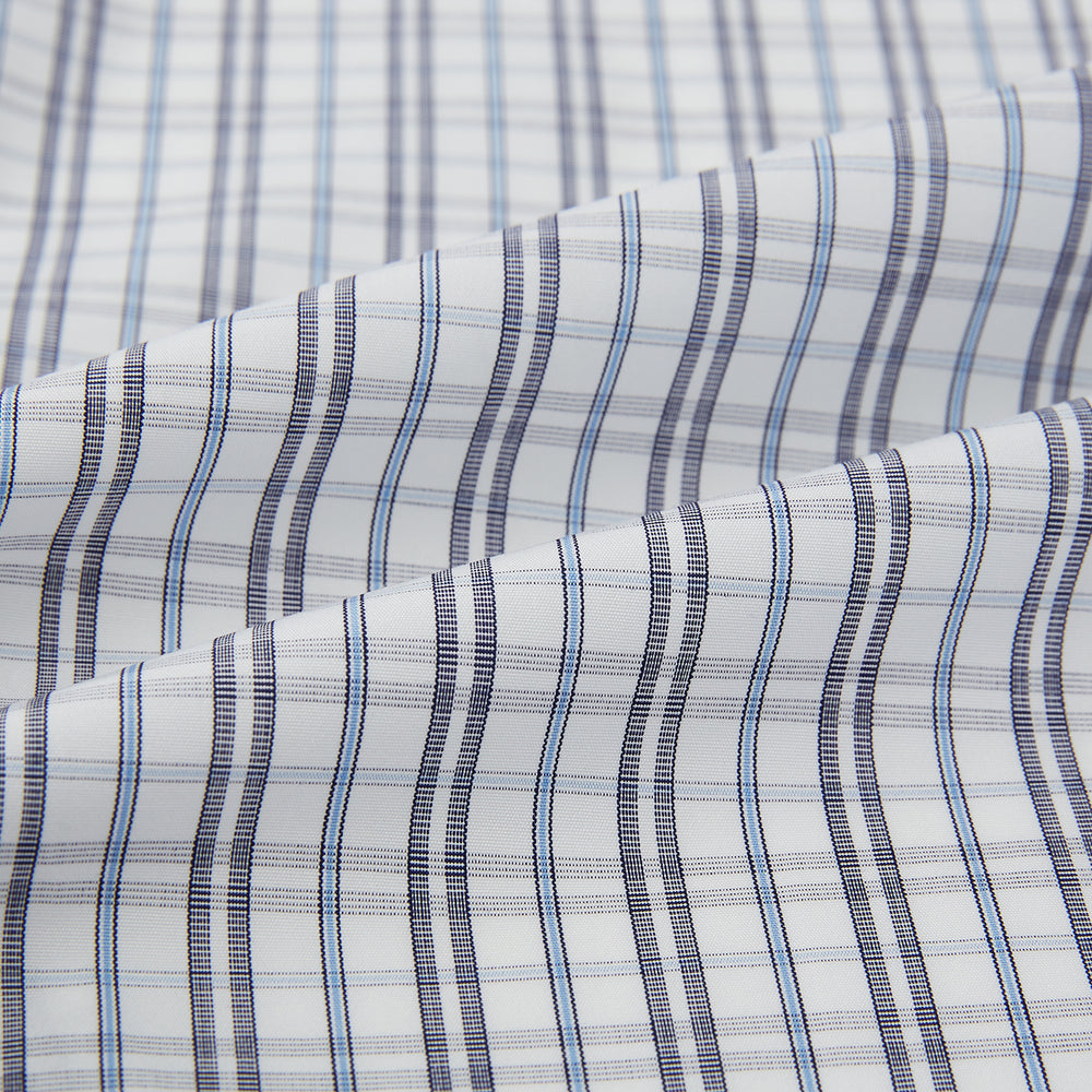 The Turnbull & Asser Navy and Blue Multi Tattersall Westminster Shirt features long sleeves, a button-down style, and a Turnbull collar in a blue and gray check pattern on white, laid flat against a white background.