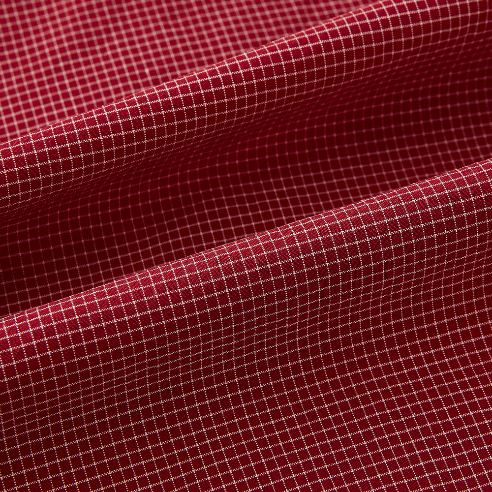 The Turnbull & Asser Dark Red Pin Check Shirt features a crisp white contrast collar and cuffs, with long sleeves and button-up design, shown against a white background.