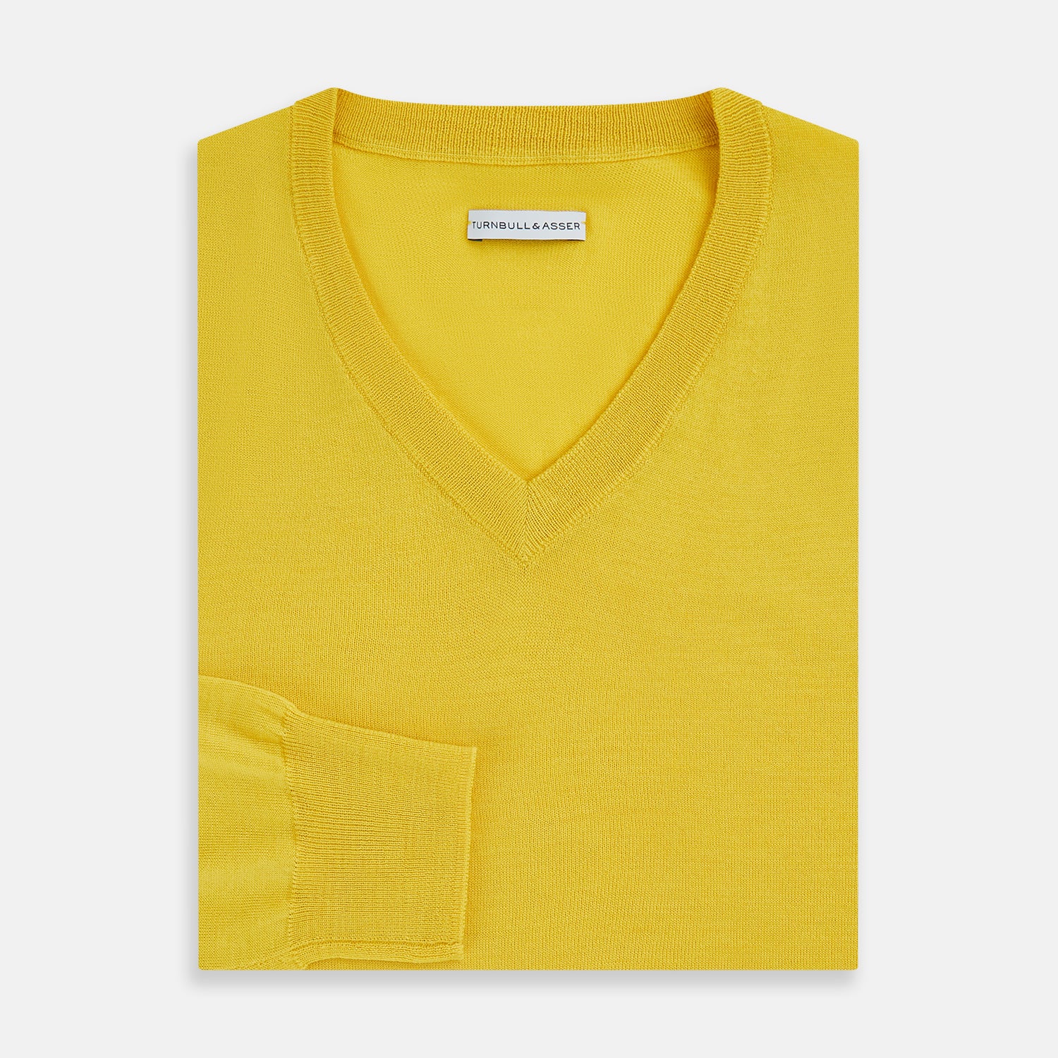 View 4 of product The Turnbull & Asser Canary Yellow Fine Merino V-Neck Jumper, crafted from soft knitwear, features long sleeves and is displayed on a white background.