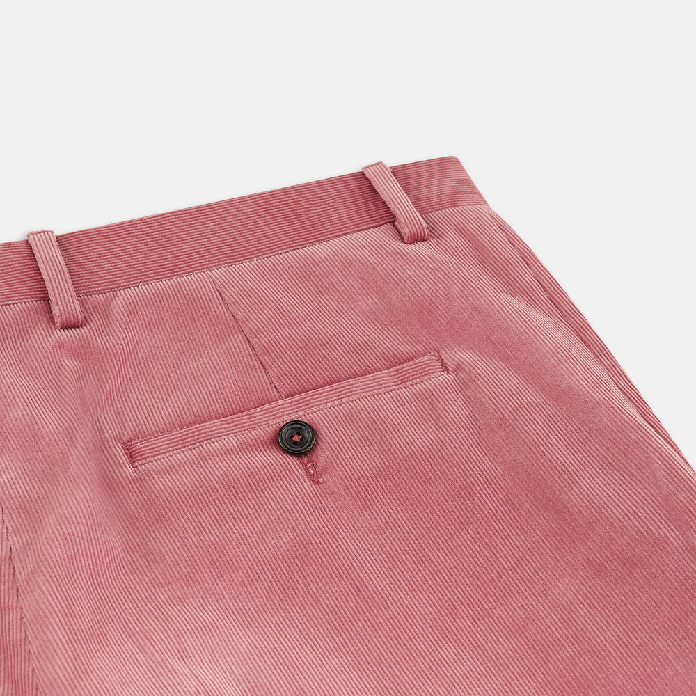 The Pink Cord Manson Trouser by Turnbull & Asser features a modern classic cut in dusty pink with straight legs, side pockets, and belt loops, shown against a plain white background.