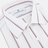 View 2 of product The Turnbull & Asser Wine Track Stripe Mayfair Shirt is a white long-sleeve shirt with vertical wine stripes and a pointed collar, crafted from premium Italian cotton and shown flat against a plain background.