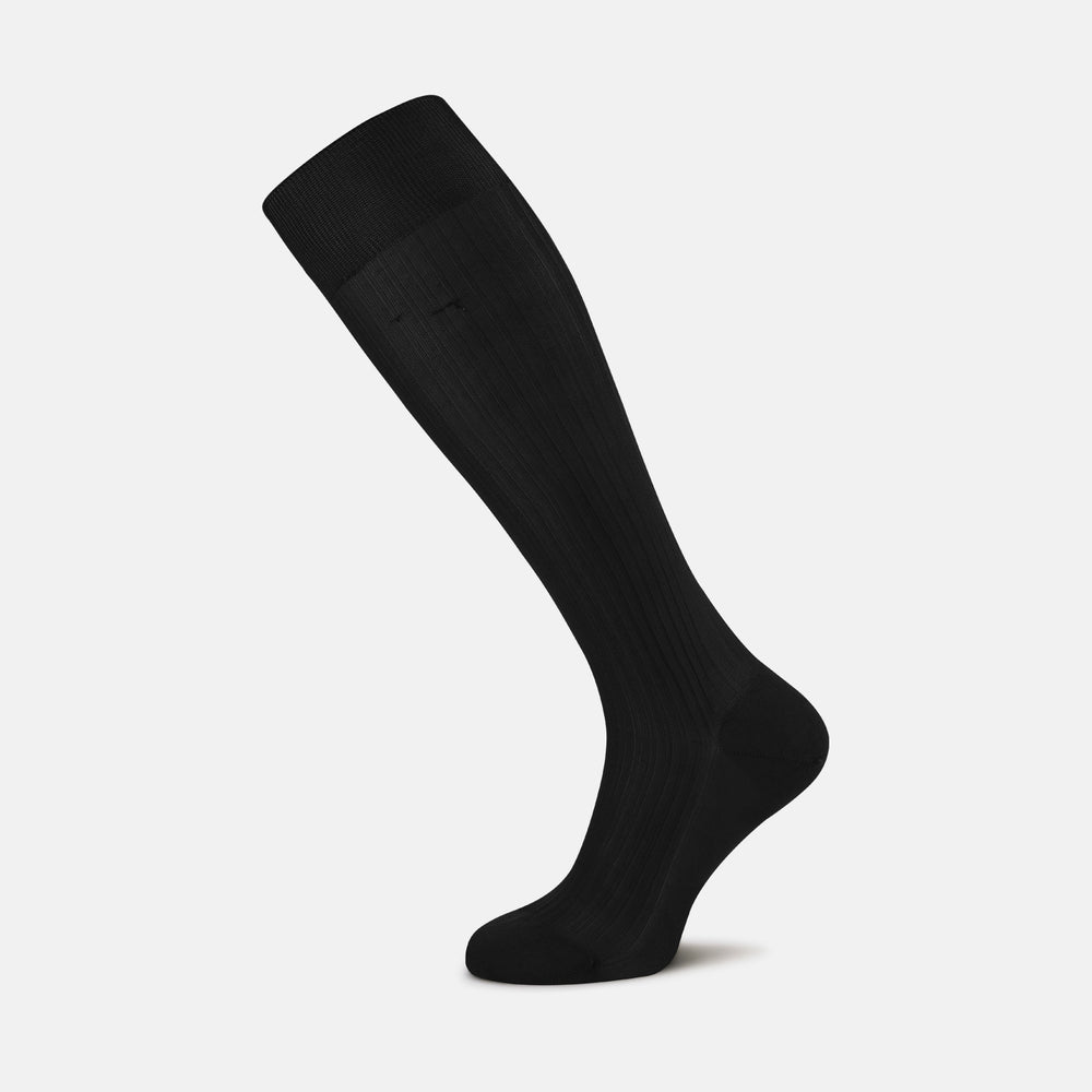 A single Black Long Silk Sock by Turnbull & Asser, featuring a ribbed texture, is displayed against a plain white background.