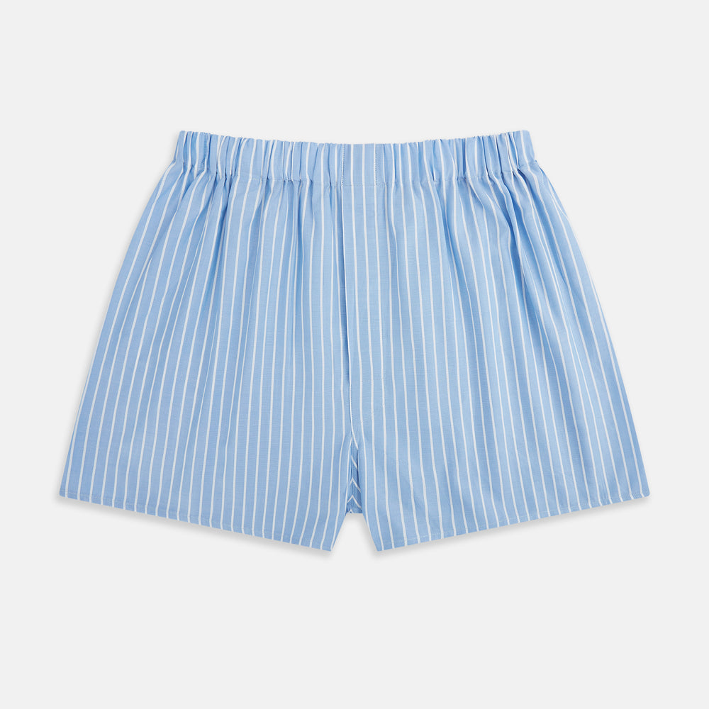 Turnbull & Asser White and Blue Stripe Godfrey Boxer Shorts, crafted from premium Italian cotton with vertical white pinstripes, an elastic waistband, and a loose fit, are shown laid flat on a white background.