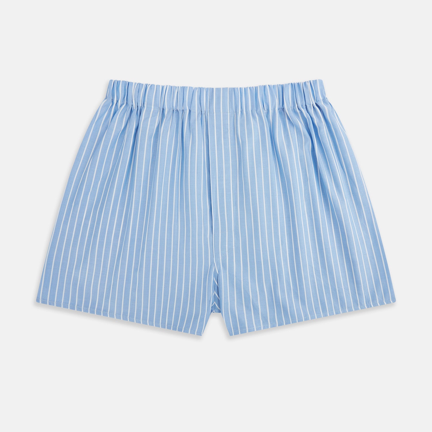 View 1 of product Turnbull & Asser White and Blue Stripe Godfrey Boxer Shorts, crafted from premium Italian cotton with vertical white pinstripes, an elastic waistband, and a loose fit, are shown laid flat on a white background.