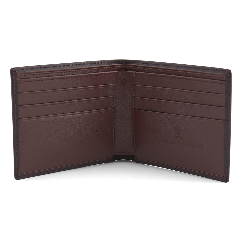 The Turnbull & Asser Brown Leather Billfold Wallet is shown closed against a plain white background, highlighting its slim, stylish design for everyday use.