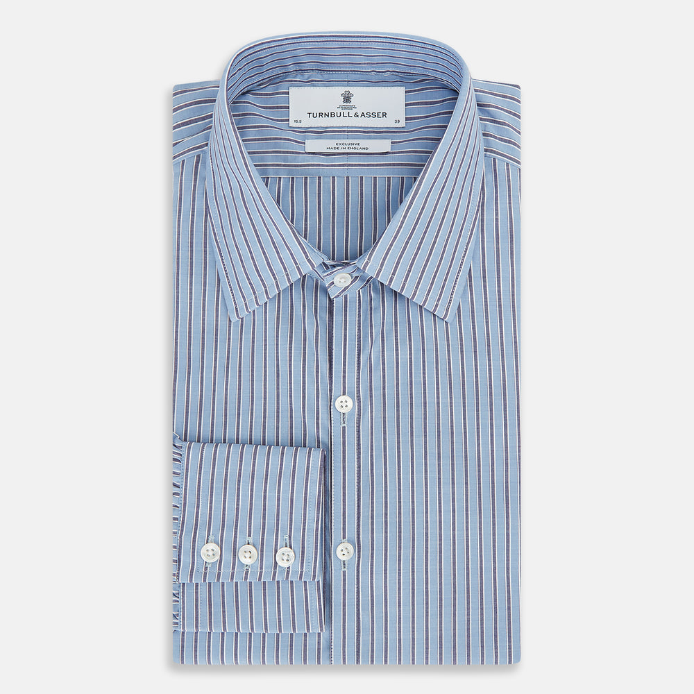 The Steel Blue Ticking Stripe Westminster Shirt by Turnbull & Asser features a classic fit, Turnbull collar, vertical stripes, white buttons, and buttoned cuffs—showcasing refined British craftsmanship.