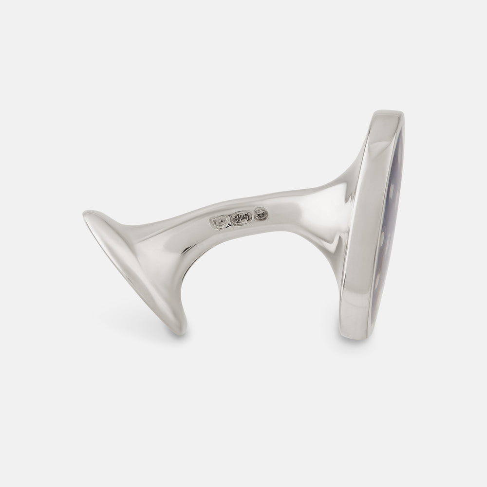 The Turnbull & Asser Navy Spotted Circle Enamel Cufflinks feature round faces with silver polka dots, offering a classic men's accessory in a striking navy design.