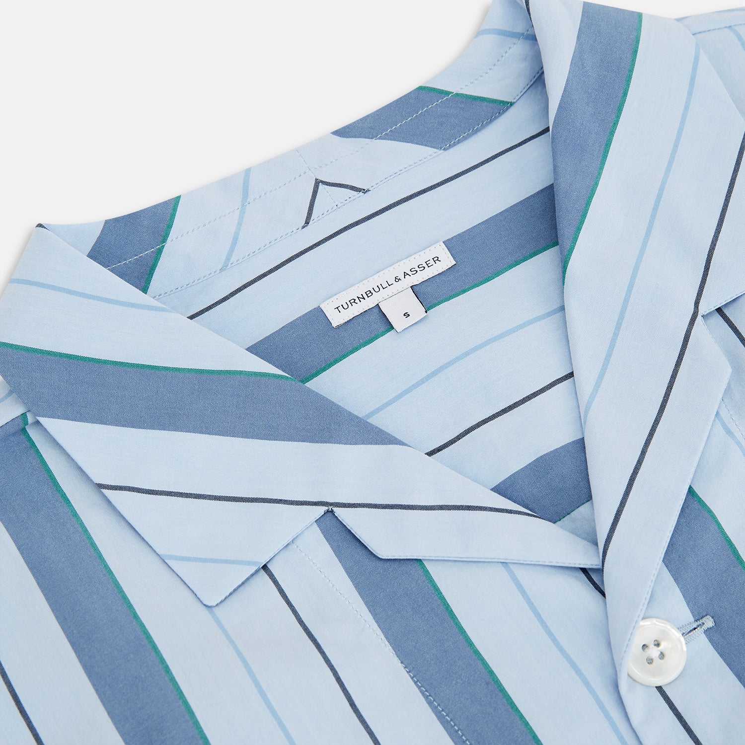 View 2 of product The Blue Baiadera Stripe Pyjama Shirt by Turnbull & Asser features long sleeves, a chest pocket, and a notched collar for an elegant nightwear look, shown on a white background.