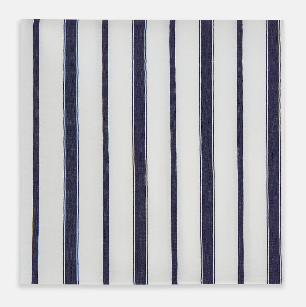 The Navy Double Stripe Hand-Rolled Handkerchief by Turnbull & Asser features evenly spaced navy and black stripes on white fabric, meticulously crafted in England with hand-rolled edges.